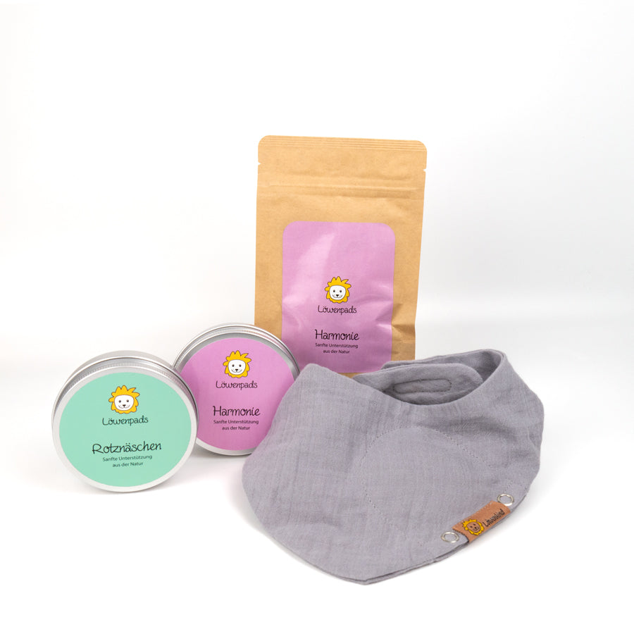 Zahnen-Special-Set mit Lätzchen in der Farbe "Grau" mit zwei Kräuterpad-Dosen und einer 10er-Nachfüllpackung